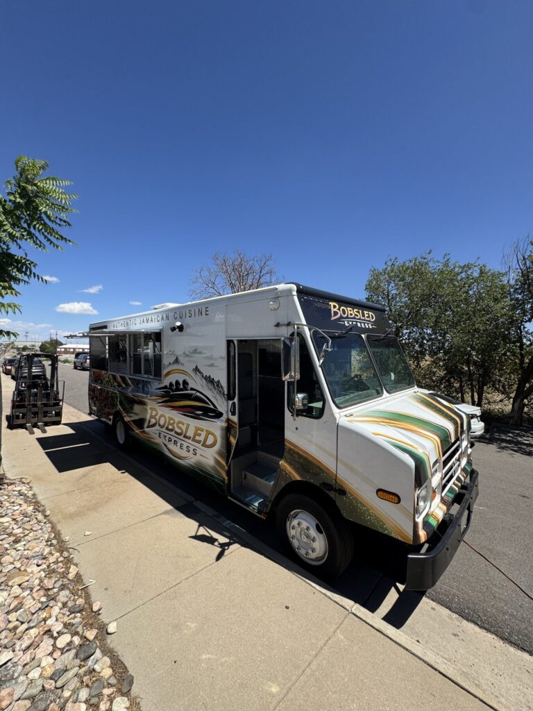 20ft jerk chicken truck with a charcoal porch, Laramie
