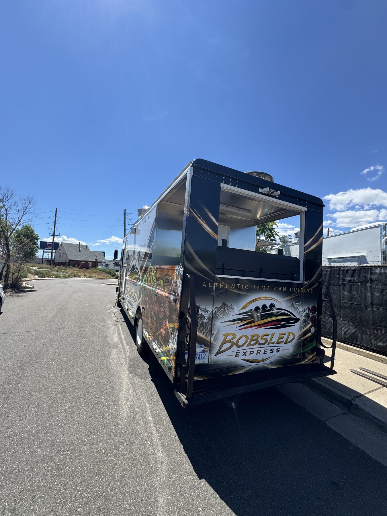 Open back of the twenty foot food truck showing the six foot rear porch
