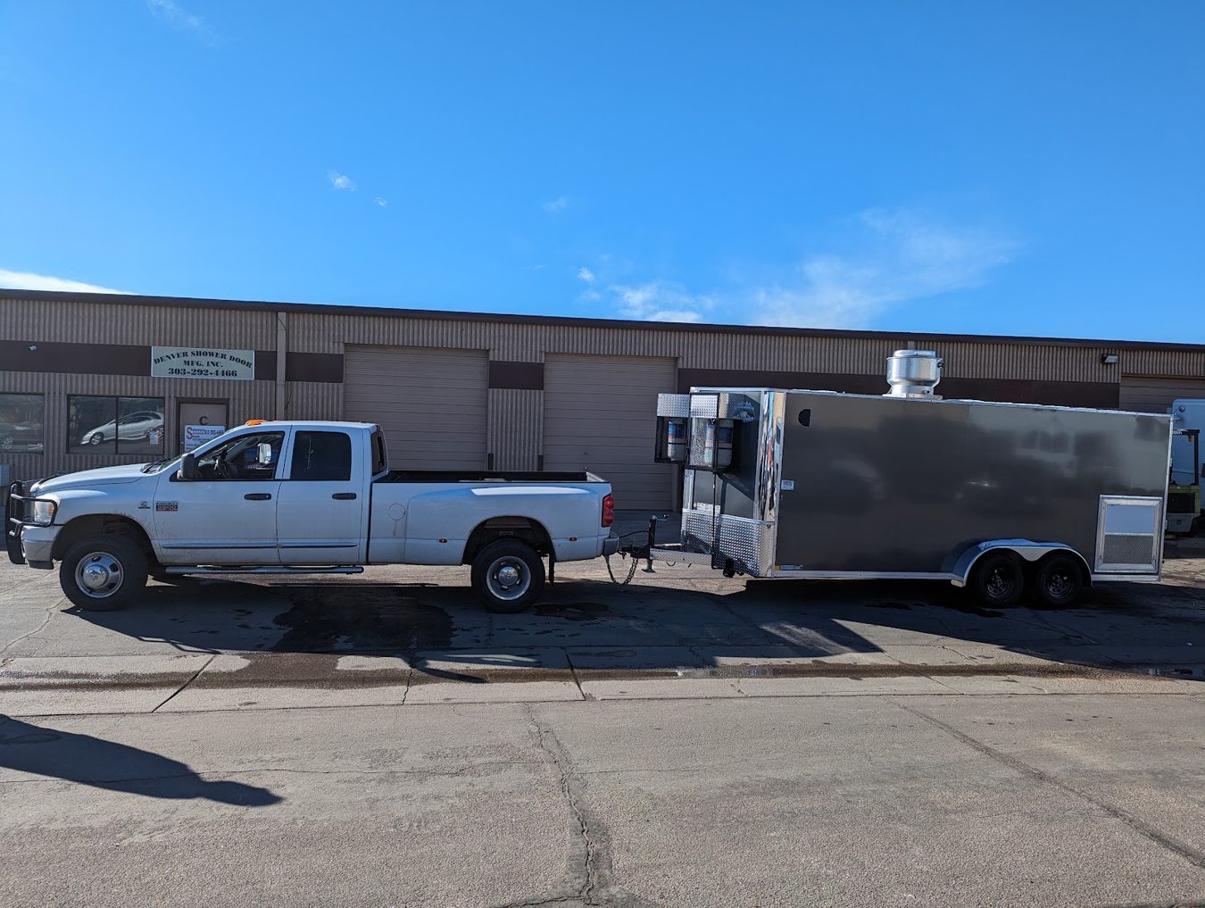 The eighteen foot tempura trailer hitched to a pickup for the drive to Lander, Wyoming